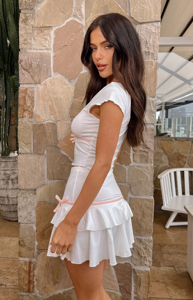 12053-alayna-white-bow-mini-skirt-1.webp